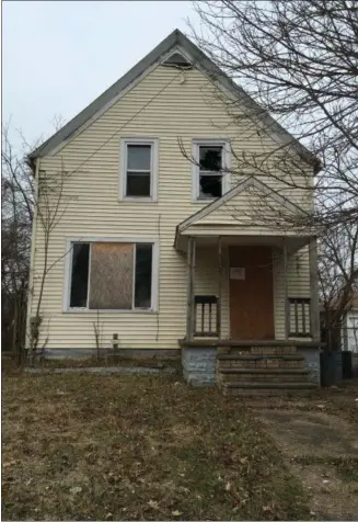  ?? RICHARD PAYERCHIN — THE MORNING JOURNAL ?? On Dec. 20, the Lorain Demolition Board of Appeals ruled 312 W. 26th St. is a hazard to public health in Lorain and should be demolished.