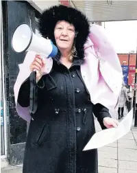  ??  ?? Peel Street toilets campaigner Cheryl Duffy on her soapbox in Accrington town centre