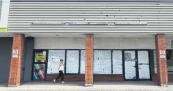  ?? RICHARD LAUTENS TORONTO STAR ?? A new pot shop is slated to open in an empty store in a small strip mall on Gerrard St., just east of Victoria Park.