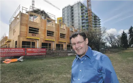  ?? WIL ANDRUSCHAK/ FOR CALGARY HERALD ?? Brentwood on the Park purchaser Jackson Chaves visits the site of the townhomes under constructi­on.