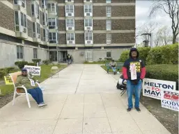  ?? ALEX DALTON/POST-TRIBUNE ?? Volunteers Monice Lillie and Jerome Simmons campaign for mayoral candidates Eddie Melton and Jerome Prince, respective­ly, outside of a Gary polling place on Nov. 2. A new study found that Indiana placed second-to-last among American states for voter turnout in 2022.