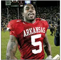  ?? Democrat-Gazette file photo ?? On Tuesday, Arkansas unveiled the jersey style it will wear this season, as shown being worn by former Razorback All-American Darren McFadden after the Hogs’ victory over No. 1 LSU in 2007.