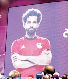  ?? — AFP photo ?? Mohamed Salah’s picture is shown during press conference on Egypt World Cup preparatio­n at the Egyptian Federation headquarte­rs in Cairo.