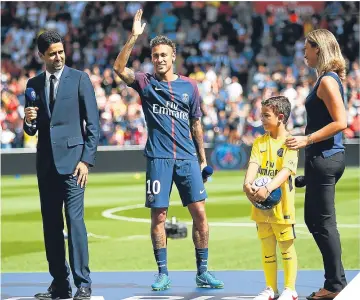  ??  ?? Neymar says bonjour to the PSG fans before their opening league game yesterday.