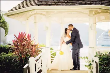  ?? Contribute­d Photo ?? A couple, just married in Jamaica, is pictured during a wedding giveaway promotion. The event was organized, promoted and executed by Stamford-based Romantic Marketing Expert, Jacqueline Johnson, on behalf of the Jamaican government.