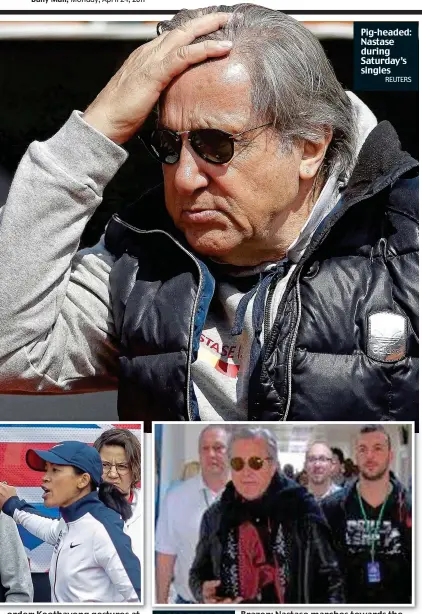  ?? REUTERS ?? Pig-headed: Nastase during Saturday’s singles Brazen: Nastase marches towards the VIP lounge despite having been banned DAY THREE