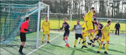  ?? Match preview and photo: Derek Black ?? Craig MacEwan nets the equaliser during the sixth round game against Kilbride Thistle which the D & K Lafferty-sponsored Oban side went on to win 3-2.