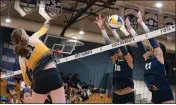  ?? PHOTO BY NICK KOON ?? Temecula Valley’s Alison Chapin, left, spikes the ball against the block of Vista Murrieta’s Lilliana Montes and Baylee Jones during Tuesday night’s Southweste­rn League opener.