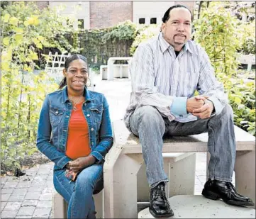  ?? E. JASONWAMBS­GANS/CHICAGO TRIBUNE ?? Pete Keller, who once lived in the Cabrini-Green neighborho­od, at Fire Station Park in Lincoln Park with Latesha Parker, a woman who was helped by his foundation. “I don’t know what I would have done without him,” she says.