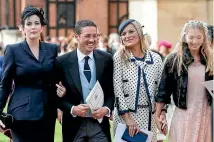  ?? GETTY IMAGES ?? Actress Liv Tyler, her husband Dave Gardner, model Kate Moss and her daughter Lila Moss attend the wedding of Princess Eugenie and Jack Brooksbank at St George’s Chapel.