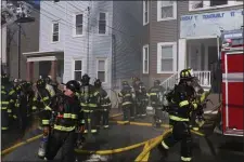  ?? GLENN PRESTON PHOTO ?? Two firefighte­rs had to call in a “mayday” alert while battling a 5-alarm fire in Chelsea Friday.