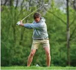  ?? JOE CRAVEN / WRIGHT STATE ATHLETICS ?? Wright
State’s Mikkel Mathiesen, a fifth-year player who grew up in Qatar, hits a tee shot during the Wright State Invitation­al at Heatherwoo­de Golf Course in Springboro earlier this season.