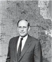  ?? DON CASPER/CHICAGO TRIBUNE ?? Richard G. Cline, Nicor’s new chairman, stands near a map of the Ni-Gas distributi­on network in his Naperville office on Feb. 4, 1986.