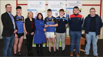  ??  ?? Joan Kelleher (LEO) presenting the ‘Best Sales Technique’ award to the team from Colaiste Mhuire, Buttevant, with Gary Lowe and judges Cathy Fitzgerald and Donal Murphy.