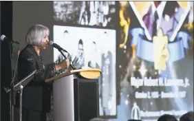  ?? Craig Bailey / Associated Press ?? Barbara Lawrence, sister of astronaut Robert H. Lawrence Jr., speaks to the crowd Friday about her brother at a memorial for him Friday in Florida.