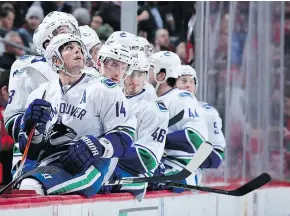  ?? — GETTY IMAGES ?? Vancouver Canucks forward Alex Burrows still can’t figure out why former head coach John Tortorella didn’t start the team’s No. 1 goalie, Roberto Luongo, in the 2014 Heritage Classic.