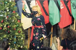  ?? Christian Abraham / Hearst Connecticu­t Media ?? First Lady Dr. Jill Biden waves to families of Navy members of the USS Delaware Thursday in Groton.