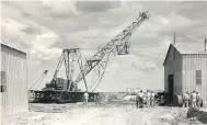  ?? (PHOTO: NUTRIEN) ?? This photo shows the dismantlin­g of Palmer No. 2 rig after completion of freeze-hole drilling in 1955.