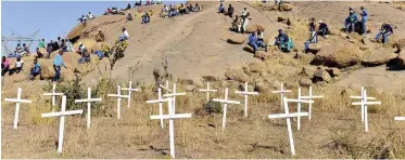  ?? BONGIWE MCHUNU ?? FAMILIES and friends of Marikana miners killed by the police gather at a Koppie during the cleansing ceremony held in Wonderkop, Marikana, Rustenburg. |