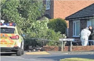  ??  ?? Police at the scene of the getaway crash in Victoria Road, Ince Blundell