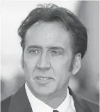  ?? LIONEL CIRONNEAU/ AP ?? Nicolas Cage gave Jim Carrey a rave review of “Memoirs and Misinforma­tion.”
