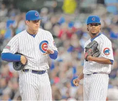  ?? | BRIAN KERSEY/GETTY IMAGES ?? Anthony Rizzo (left, with losing pitcher Edwin Jackson) would be thrilled to be part of All-Star festivitie­s, even if it is just the Home Run Derby.