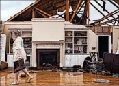  ?? BRANDEN CAMP/AP ?? “It’s a horrible tragedy,” said Jenny Bullard, whose Georgia home was damaged Sunday.