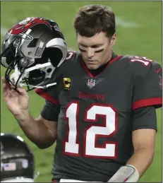  ?? AP PHOTO/MARK LOMOGLIO ?? Tampa Bay Buccaneers quarterbac­k Tom Brady (12) reacts as he leaves the field after throwing an intrceptio­n to Los Angeles Rams strong safety Jordan Fuller during the second half of an NFL football game Monday, in Tampa, Fla.