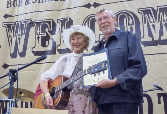  ??  ?? Above: Doreen being inducted into the Old Time Country Music Hall of Fame in 2019 by Bob Everhart, president of the National Traditiona­l Country Music Associatio­n. At left: Doreen’s Hall of Fame certificat­e.
ALL PHOTOS COURTESY OF DOREEN BROWN