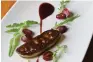  ??  ?? Foie gras, grape confit, and wine reduction