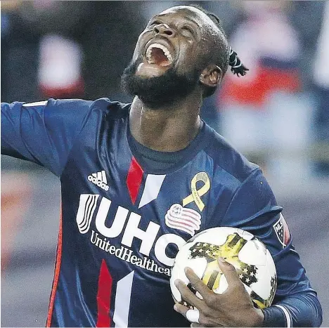  ?? MICHAEL DWYER/THE CANADIAN PRESS FILES ?? Former New England Revolution’s Kei Kamara celebrates a goal during an MLS game in Foxborough, Mass., The Whitecaps acquired striker Kamara on Sunday in a trade with New England. Caps coach Carl Robinson says Kamara “thrives off crosses”.