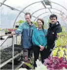  ??  ?? Sheldon Levet (left), Kate Walmsley and Rory LenihanIki­n in Kaicycle’s tunnel house.