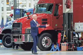  ?? WALSH/AP SUSAN ?? President Joe Biden, who has made manufactur­ing jobs a priority, tours Mack Truck’s Lehigh Valley operations facility on Wednesday in Macungie, Pa.