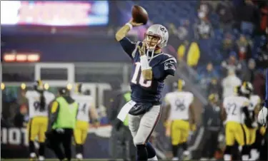  ?? ELISE AMENDOLA — ASSOCIATED PRESS ?? Patriots quarterbac­k Jimmy Garoppolo warms up before the AFC championsh­ip game against the Steelers on Jan. 22 in Foxborough, Mass.