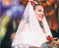  ?? GABRIELA CAMPOS/THE NEW MEXICAN ?? Katherine Elizabeth García y Arellano, 26, was selected as La Reina de La Fiesta de Santa Fe for 2018. She is seen Thursday as part of the festivitie­s.