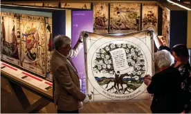  ?? Wilkie. Photograph: Murdo MacLeod/The Guardian ?? The last touches are put to the last panel before it is hung by Dorie Wilkie, Susie Finlayson and Tom