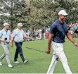  ?? | TANNEN MAURY EPA ?? TIGER Woods walks to the eighth tee at Augusta on Monday, followed by Fred Couples and Justin Thomas.