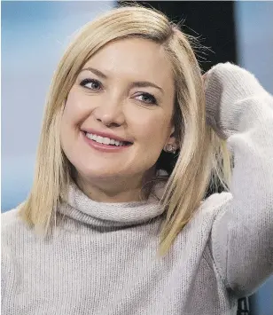  ?? CHARLES SYKES / INVISION / AP ?? Mother to two boys, 37-year- old Kate Hudson co-stars as the wife of an oil-rig technician in a recounting of the 2010 spill off the Louisiana coast.