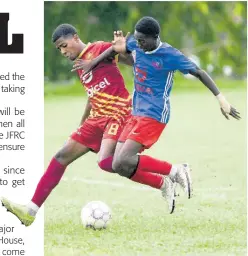  ?? RICARDO MAKYN ?? Javughn Barrett of Wolmer’s Boys’ School is placed under pressure by Camperdown’s Junior Grizzelle during their ISSA/Digicel Manning Cup match at Alpha Institute on Friday. Camperdown won 1-0.