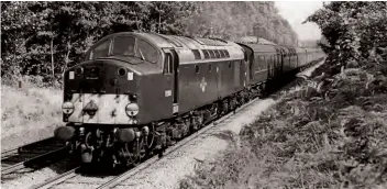  ??  ?? EnglishEle­ctricType4­s (later Class40) replacedst­eamon GEMain Lineservic­esto Norwichfro­m 1958. Here, No. D200 climbsBels­teadBankwi­th the 11.40 Norwich-LiverpooSl treet on September7, 1964.