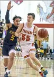  ?? Alexandra Wimley/Post-Gazette ?? North Catholic’s Isaac DeGregorio (55) drives during Monday’s game.