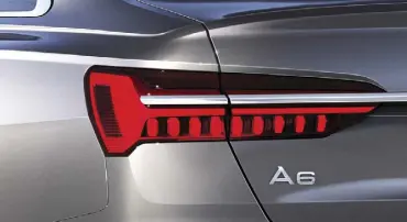  ??  ?? The wedge-shaped rear lights, which feature vertical segments, also contribute to the impression of width.