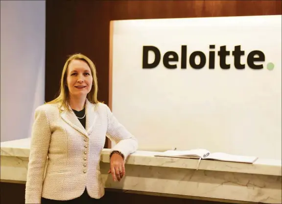  ?? Tyler Sizemore / Hearst Connecticu­t Media file photo ?? Deloitte Stamford Managing Partner Heather Ziegler stands in the company’s offices at 695 E. Main St., in Stamford on March 8, 2018.