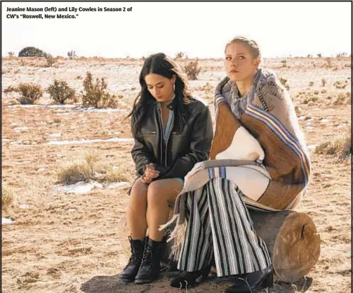  ??  ?? Jeanine Mason (left) and Lily Cowles in Season 2 of CW’s “Roswell, New Mexico.”