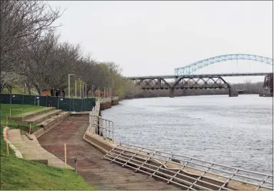  ?? Cassandra Day / Hearst Connecticu­t Media ?? The boardwalk at Harbor Park in Middletown will be completely redone, as worn timber is replaced with a concrete based foundation and the railings up to building safety codes.