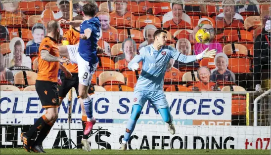  ??  ?? Chris Kane rises to make it 2- 1 to St Johnstone before Lawrence Shankland’s effort forced a share of the spoils
