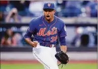  ?? Frank Franklin II / Associated Press ?? New York Mets relief pitcher Edwin Diaz celebrates after the first game of the team’s doublehead­er against the St. Louis Cardinals on Tuesday in New York. The Mets won 3-1.