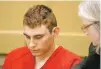  ?? ASSOCIATED PRESS FILE PHOTO ?? Nikolas Cruz, accused of murdering 17 people in the Florida high school shooting, appears in court earlier this month for a status hearing in Fort Lauderdale, Fla.