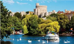  ??  ?? Bobbing along: Take in views of Windsor Castle from the River Thames