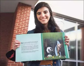  ?? Brian A. Pounds / Hearst Connecticu­t Media ?? Roger Ludlowe High School student Layla Aziz, 16, created the illustrati­ons for a book about inclusion.